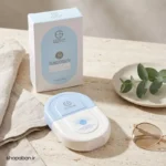 کرم ضد آفتاب استلین آبی SPF50 بی رنگ روی میز