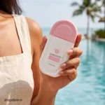 کرم ضد آفتاب استلین صورتی SPF90 بی رنگ در دست